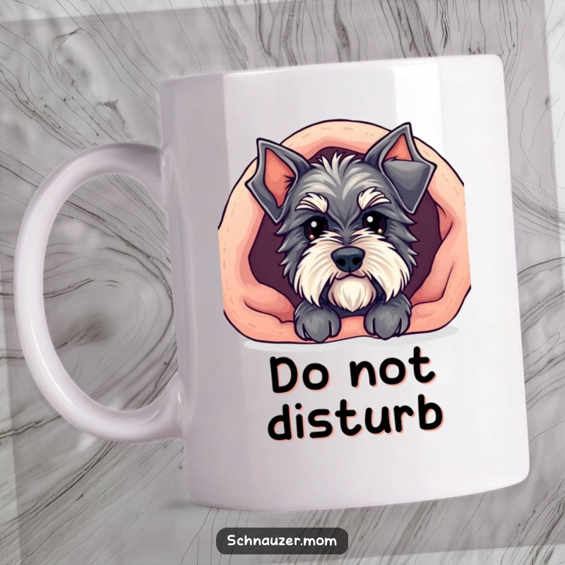 Funny Kawaii Schnauzer mug showing a cute dog peeking out from under a cozy blanket, radiating warmth and comfort.