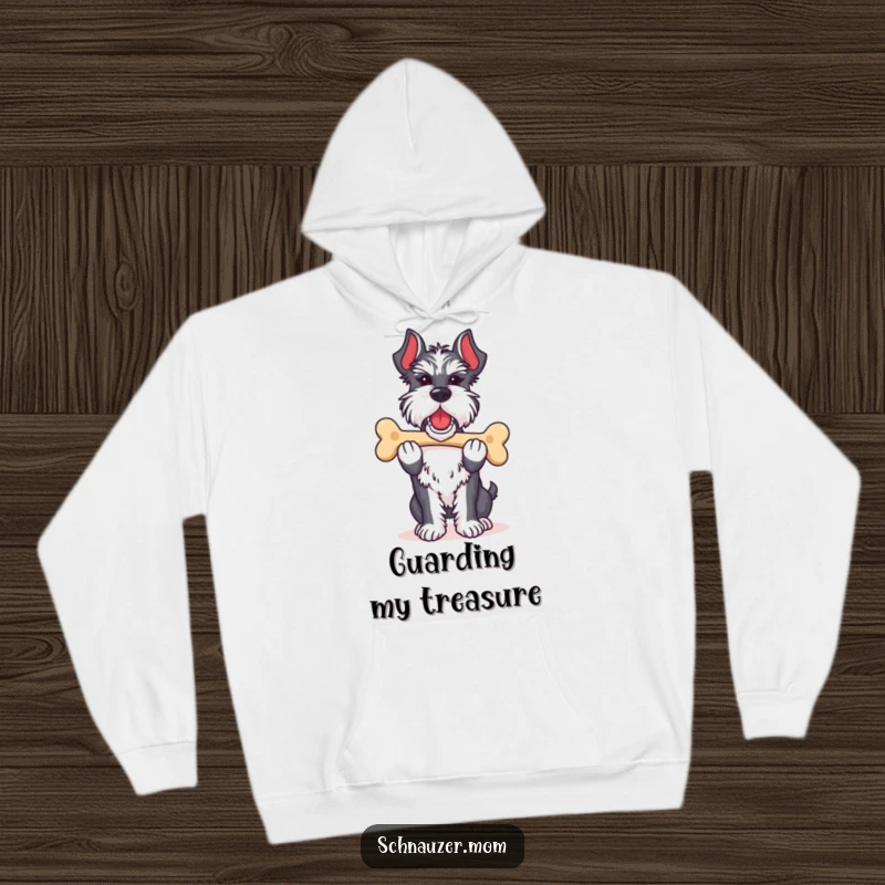 Funny Schnauzer lady hoodie capturing a dog proudly carrying its favorite bone, symbolizing achievement and cozy comfort.