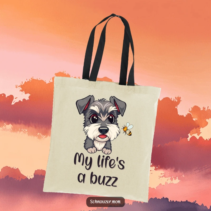 Funny Kawaii Schnauzer Tote Bag, showing a dog intensely watching a bee, a great everyday carry-all.